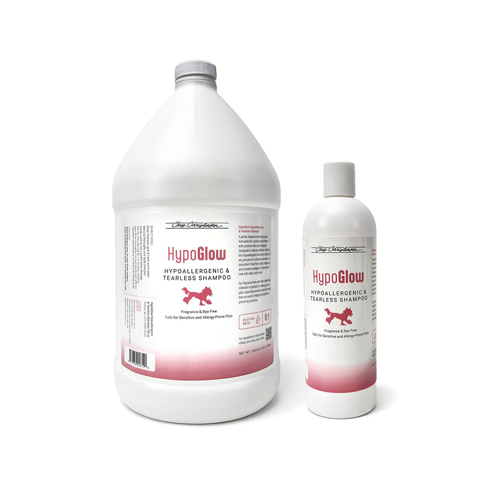 Two bottles of HypoGlow shampoo on a white background