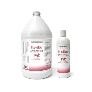 Two bottles of HypoGlow shampoo on a white background