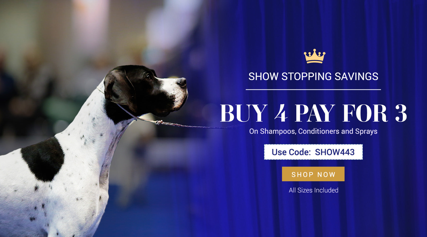 Promotional banner featuring a black and white dog on the left against a blue curtain backdrop, with large text on the right reading 'SHOW STOPPING SAVINGS', 'BUY 4 PAY FOR 3', a coupon code 'SHOW443', and a 'SHOP NOW' button.