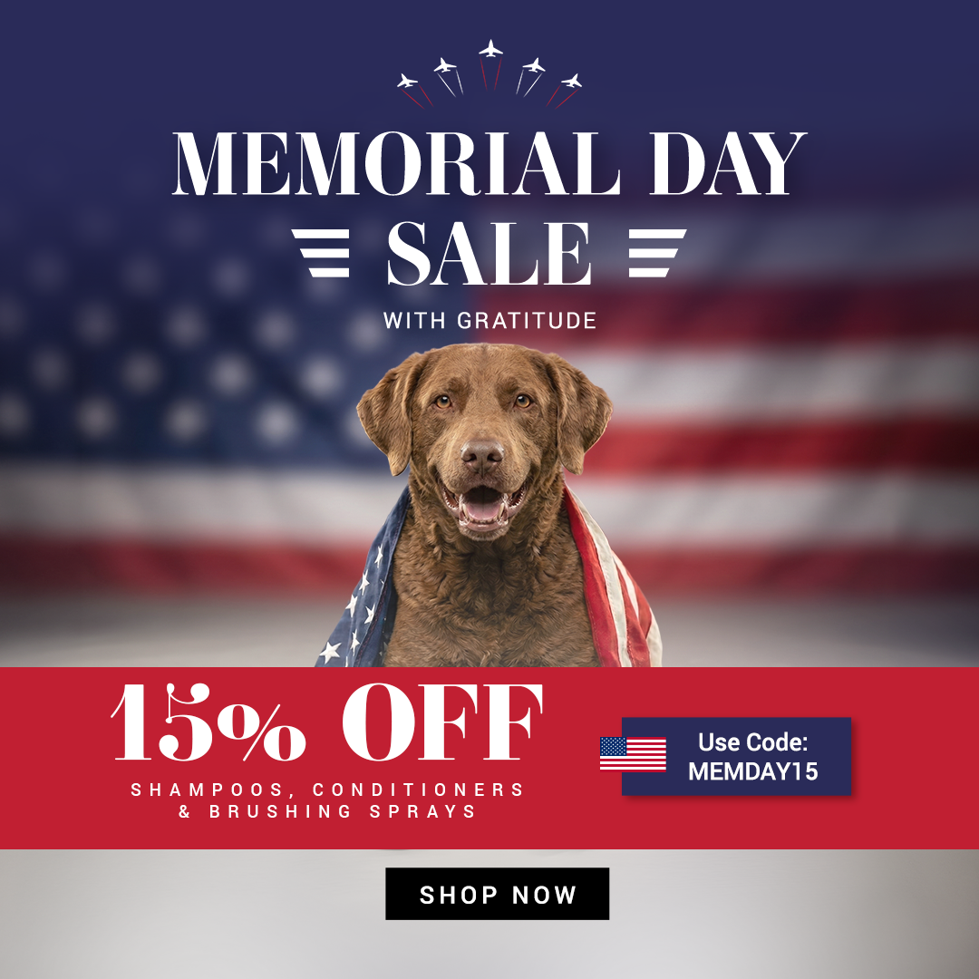 Memorial Day sale advertisement with a dog wrapped in an American flag and a discount offer.