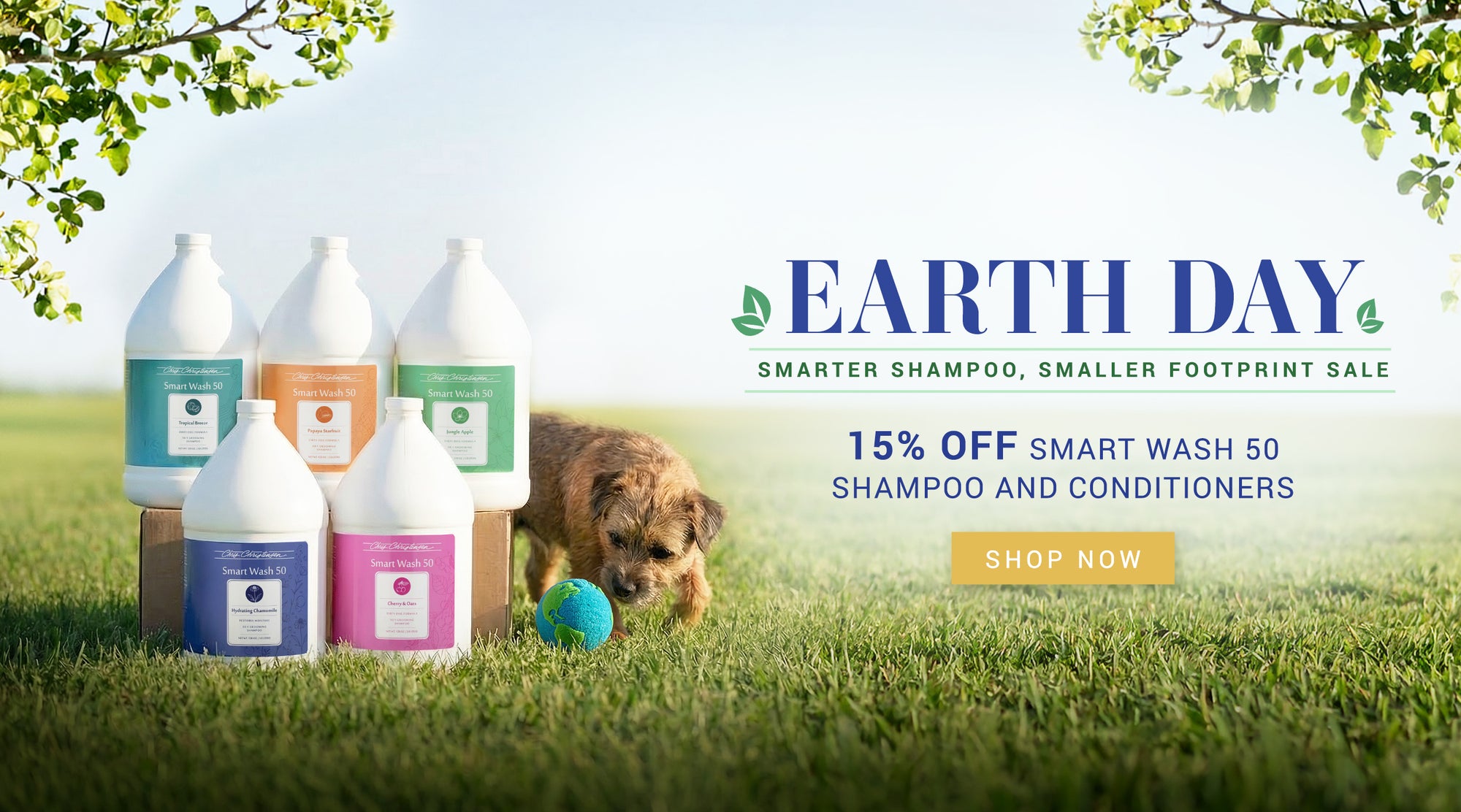 Bottles of shampoo and conditioner on grass with a dog, promotional text for Earth Day sale.