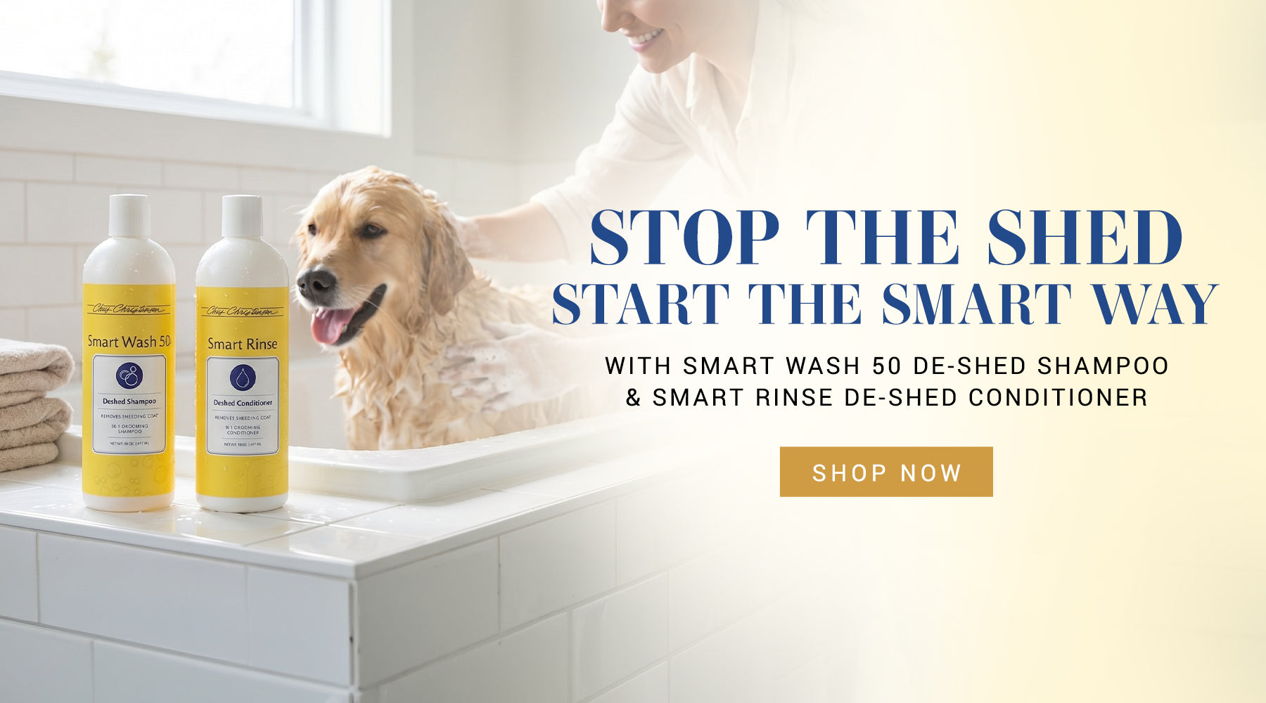 Dog being bathed with Smart Wash shampoo and conditioner bottles on a bathtub ledge.