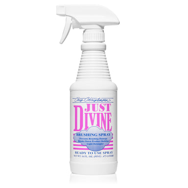 White spray bottle labeled 'Just Divine' on a white background