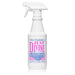 White spray bottle labeled 'Just Divine' on a white background
